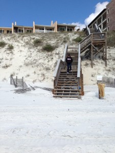 Annette Shope takes the steps to the beach.